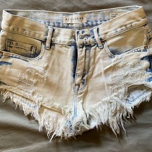 Light wash distressed denim shorts
